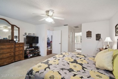 This Beautiful Extended Oakmont Model End Unit Villa overlooking on Timber Pines Golf Course in Florida - for sale on GolfHomes.com, golf home, golf lot