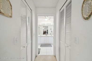This Beautiful Extended Oakmont Model End Unit Villa overlooking on Timber Pines Golf Course in Florida - for sale on GolfHomes.com, golf home, golf lot