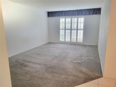Blank Canvas !! Quiet & rare 3 bedroom, 2 bathroom oversized on Countryside Country Club in Florida - for sale on GolfHomes.com, golf home, golf lot