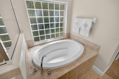 Tucked away in a quiet, tree-lined cul-de-sac in the gated Grand on Grand Haven Golf Club in Florida - for sale on GolfHomes.com, golf home, golf lot