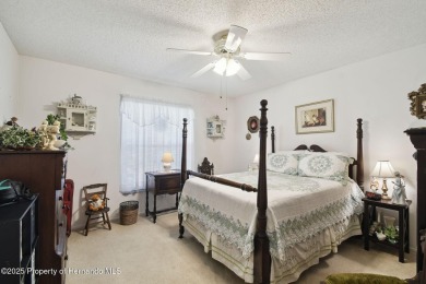 This Beautiful Extended Oakmont Model End Unit Villa overlooking on Timber Pines Golf Course in Florida - for sale on GolfHomes.com, golf home, golf lot