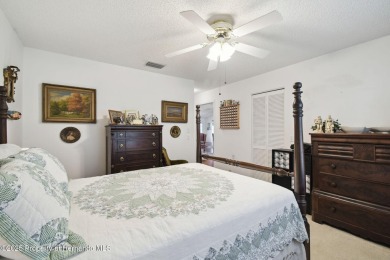 This Beautiful Extended Oakmont Model End Unit Villa overlooking on Timber Pines Golf Course in Florida - for sale on GolfHomes.com, golf home, golf lot