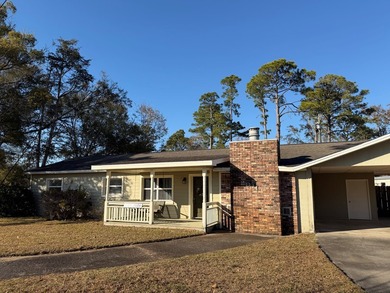 This charming home is located on a spacious 0.26-acre corner lot on  in Florida - for sale on GolfHomes.com, golf home, golf lot