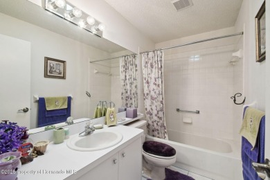 This Beautiful Extended Oakmont Model End Unit Villa overlooking on Timber Pines Golf Course in Florida - for sale on GolfHomes.com, golf home, golf lot