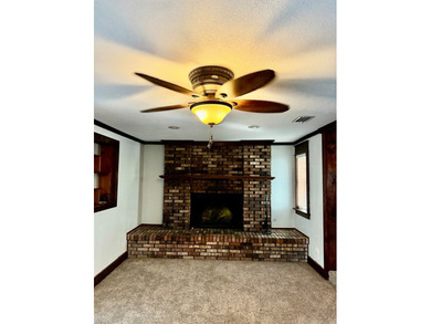 This charming home is located on a spacious 0.26-acre corner lot on  in Florida - for sale on GolfHomes.com, golf home, golf lot