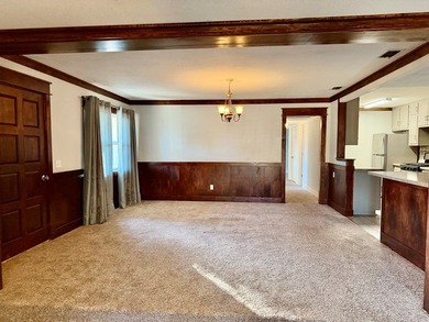 This charming home is located on a spacious 0.26-acre corner lot on  in Florida - for sale on GolfHomes.com, golf home, golf lot