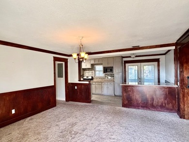 This charming home is located on a spacious 0.26-acre corner lot on  in Florida - for sale on GolfHomes.com, golf home, golf lot