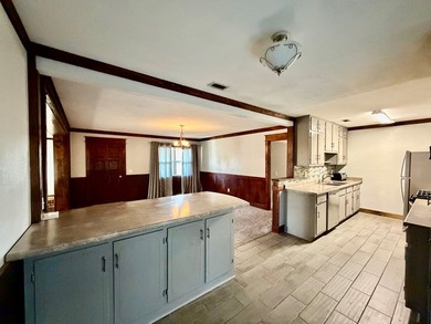 This charming home is located on a spacious 0.26-acre corner lot on  in Florida - for sale on GolfHomes.com, golf home, golf lot