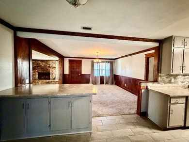 This charming home is located on a spacious 0.26-acre corner lot on  in Florida - for sale on GolfHomes.com, golf home, golf lot