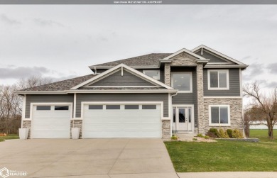 SHOW STOPPER!! Welcome to 1150 Cardinal Drive, a beautifully on Tournament Club of Iowa in Iowa - for sale on GolfHomes.com, golf home, golf lot