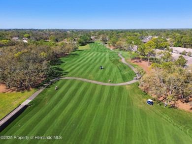 This Beautiful Extended Oakmont Model End Unit Villa overlooking on Timber Pines Golf Course in Florida - for sale on GolfHomes.com, golf home, golf lot