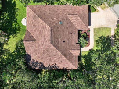 Tucked away in a quiet, tree-lined cul-de-sac in the gated Grand on Grand Haven Golf Club in Florida - for sale on GolfHomes.com, golf home, golf lot