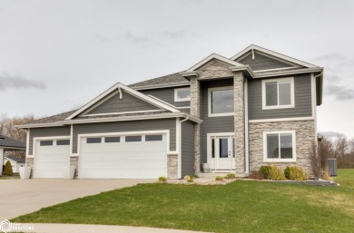 SHOW STOPPER!! Welcome to 1150 Cardinal Drive, a beautifully on Tournament Club of Iowa in Iowa - for sale on GolfHomes.com, golf home, golf lot