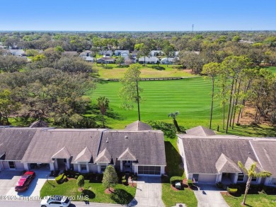 This Beautiful Extended Oakmont Model End Unit Villa overlooking on Timber Pines Golf Course in Florida - for sale on GolfHomes.com, golf home, golf lot