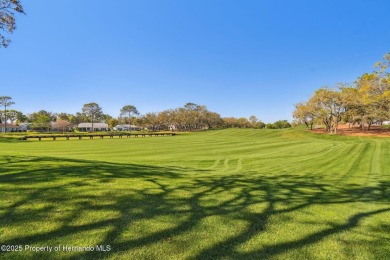 This Beautiful Extended Oakmont Model End Unit Villa overlooking on Timber Pines Golf Course in Florida - for sale on GolfHomes.com, golf home, golf lot