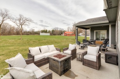 SHOW STOPPER!! Welcome to 1150 Cardinal Drive, a beautifully on Tournament Club of Iowa in Iowa - for sale on GolfHomes.com, golf home, golf lot
