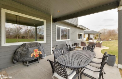 SHOW STOPPER!! Welcome to 1150 Cardinal Drive, a beautifully on Tournament Club of Iowa in Iowa - for sale on GolfHomes.com, golf home, golf lot