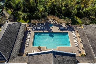 Tucked away in a quiet, tree-lined cul-de-sac in the gated Grand on Grand Haven Golf Club in Florida - for sale on GolfHomes.com, golf home, golf lot