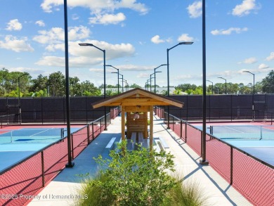 This Beautiful Extended Oakmont Model End Unit Villa overlooking on Timber Pines Golf Course in Florida - for sale on GolfHomes.com, golf home, golf lot