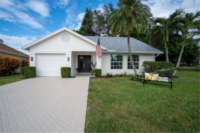 This gorgeous golf-view home has been totally renovated in 2024 on The Golf Club of Jupiter in Florida - for sale on GolfHomes.com, golf home, golf lot