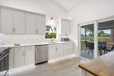 This gorgeous golf-view home has been totally renovated in 2024 on The Golf Club of Jupiter in Florida - for sale on GolfHomes.com, golf home, golf lot