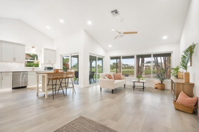 This gorgeous golf-view home has been totally renovated in 2024 on The Golf Club of Jupiter in Florida - for sale on GolfHomes.com, golf home, golf lot