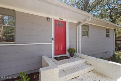 This charming 3-bedroom, 2-bath home, nestled in the heart of on Pearl Municipal Golf Course in Mississippi - for sale on GolfHomes.com, golf home, golf lot
