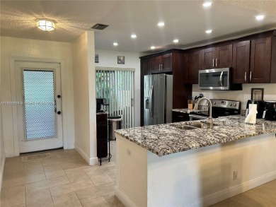 This elegantly updated villa features two bedrooms and two on Colony West Country Club in Florida - for sale on GolfHomes.com, golf home, golf lot