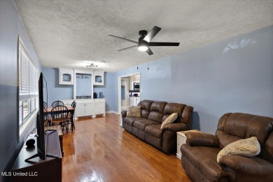 This charming 3-bedroom, 2-bath home, nestled in the heart of on Pearl Municipal Golf Course in Mississippi - for sale on GolfHomes.com, golf home, golf lot
