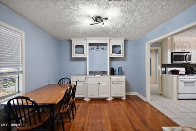 This charming 3-bedroom, 2-bath home, nestled in the heart of on Pearl Municipal Golf Course in Mississippi - for sale on GolfHomes.com, golf home, golf lot