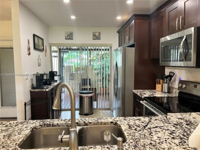 This elegantly updated villa features two bedrooms and two on Colony West Country Club in Florida - for sale on GolfHomes.com, golf home, golf lot