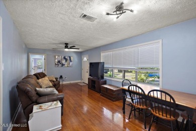 This charming 3-bedroom, 2-bath home, nestled in the heart of on Pearl Municipal Golf Course in Mississippi - for sale on GolfHomes.com, golf home, golf lot
