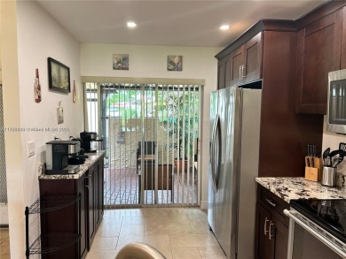 This elegantly updated villa features two bedrooms and two on Colony West Country Club in Florida - for sale on GolfHomes.com, golf home, golf lot