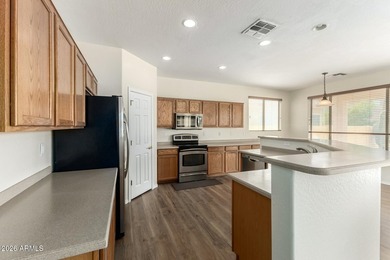 Stunning two-story residence with manicured landscape and 3-car on Southern Ridge Golf Club in Arizona - for sale on GolfHomes.com, golf home, golf lot