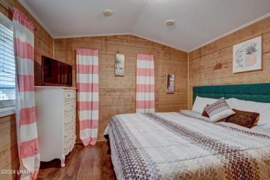 On leased land - Lakeview Escape - Fully Furnished, Steps from on London Bridge Golf Course in Arizona - for sale on GolfHomes.com, golf home, golf lot