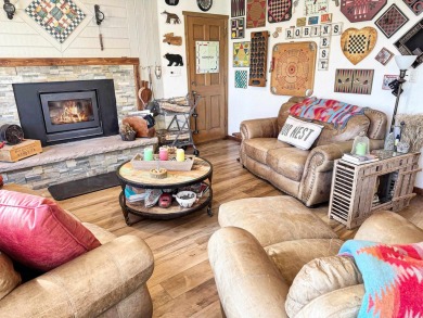 If you are looking for a mountain getaway, this charming on Angel Fire Resort Country Club in New Mexico - for sale on GolfHomes.com, golf home, golf lot