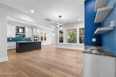 Stunning new construction in the desirable and gated community on Carolina National Golf Club in North Carolina - for sale on GolfHomes.com, golf home, golf lot