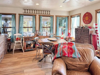 If you are looking for a mountain getaway, this charming on Angel Fire Resort Country Club in New Mexico - for sale on GolfHomes.com, golf home, golf lot