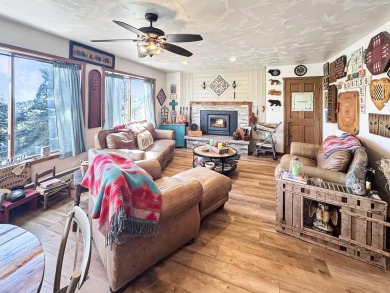 If you are looking for a mountain getaway, this charming on Angel Fire Resort Country Club in New Mexico - for sale on GolfHomes.com, golf home, golf lot