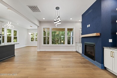 Stunning new construction in the desirable and gated community on Carolina National Golf Club in North Carolina - for sale on GolfHomes.com, golf home, golf lot