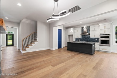 Stunning new construction in the desirable and gated community on Carolina National Golf Club in North Carolina - for sale on GolfHomes.com, golf home, golf lot