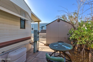 On leased land - Lakeview Escape - Fully Furnished, Steps from on London Bridge Golf Course in Arizona - for sale on GolfHomes.com, golf home, golf lot