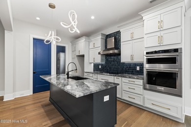 Stunning new construction in the desirable and gated community on Carolina National Golf Club in North Carolina - for sale on GolfHomes.com, golf home, golf lot