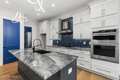 Stunning new construction in the desirable and gated community on Carolina National Golf Club in North Carolina - for sale on GolfHomes.com, golf home, golf lot