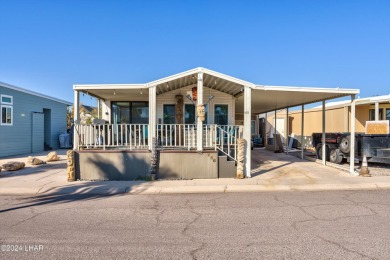 On leased land - Lakeview Escape - Fully Furnished, Steps from on London Bridge Golf Course in Arizona - for sale on GolfHomes.com, golf home, golf lot
