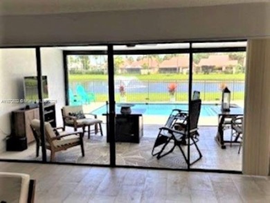 This stunning Mediterranean/Spanish-style home embodies elegance on Bear Lakes Country Club in Florida - for sale on GolfHomes.com, golf home, golf lot