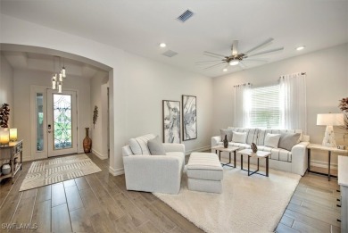 Embrace the epitome of luxury living in this exquisite home with on The Golf Club At Magnolia Landing in Florida - for sale on GolfHomes.com, golf home, golf lot