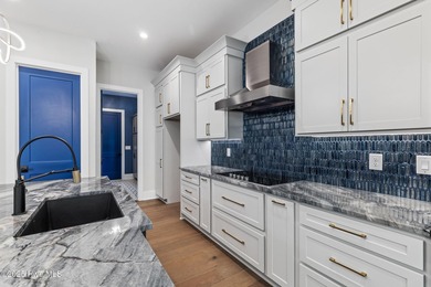 Stunning new construction in the desirable and gated community on Carolina National Golf Club in North Carolina - for sale on GolfHomes.com, golf home, golf lot