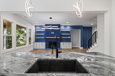 Stunning new construction in the desirable and gated community on Carolina National Golf Club in North Carolina - for sale on GolfHomes.com, golf home, golf lot