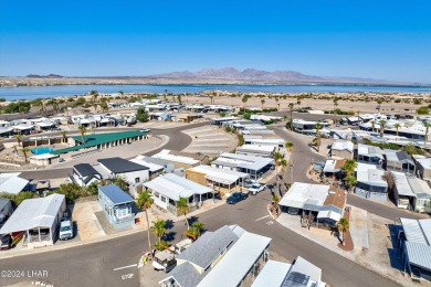 On leased land - Lakeview Escape - Fully Furnished, Steps from on London Bridge Golf Course in Arizona - for sale on GolfHomes.com, golf home, golf lot